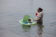 A little baby gets some assistance floating around the lagoon at Euclid Beach Park.  A heat wave rolled into the Northeast Ohio area on Monday, June 17, 2024, with temperatures expected to be in the 90’s for most of the week.  David Petkiewicz, cleveland.com