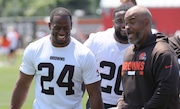 Cleveland Browns running backs coach Duce Staley jokes with Cleveland Browns running back Nick Chubb during minicamp in Berea.