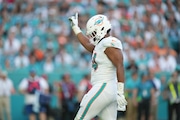 Miami Dolphins defensive tackle Christian Wilkins makes a defensive stop during the game against the New York Jets on Sunday, December 17, 2023 at Hard Rock Stadium, Hard Rock Stadium, FL. (Photo by Peter Joneleit/Icon Sportswire via Getty Images)