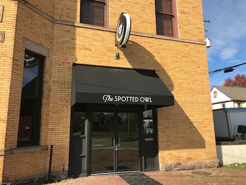 After five years in Clevelands Tremont neighborhood Will Hollingsworth has expanded his cocktail bar south to Akron.