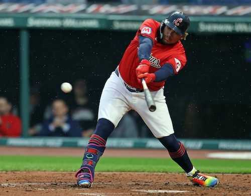 Cleveland Guardians first baseman Josh Naylor singles on a line drive against the Boston Red Sox in the fourth inning.