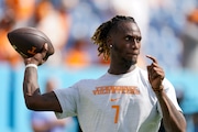 Tennessee quarterback Joe Milton III (7) warms up before an NCAA college football game against Virginia, Saturday, Sept. 2, 2023, in Nashville, Tenn. (AP Photo/George Walker IV)