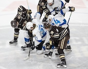 Hershey Bear’s Riley Sutter fights for the puck with Cleveland’s Josh Duane at center ice. June 1, 2024. Jimmie Brown. jbrown@pennlive.com.