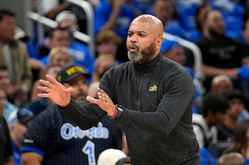 Cleveland Cavaliers coach J.B. Bickerstaff appeals to an official about pushing during the first half of Game 3 of the team's NBA basketball first-round playoff series against the Orlando Magic, Thursday, April 25, 2024, in Orlando, Fla. (AP Photo/John Raoux)