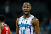 Four-time NBA All-Star and former Charlotte Hornets guard Kemba Walker is retiring from basketball after 12 seasons in the NBA, he announced Tuesday. Walker, 34, also played for the Boston Celtics, New York Knicks and Dallas Mavericks during his career. (AP Photo/Nell Redmond)