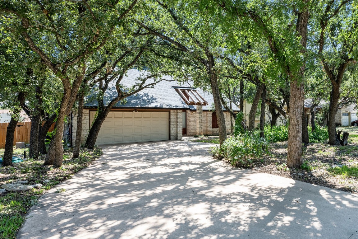 a house with trees in front of it