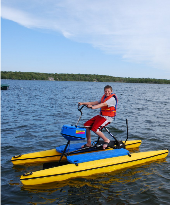 blue and yellow water bike on wooden dock