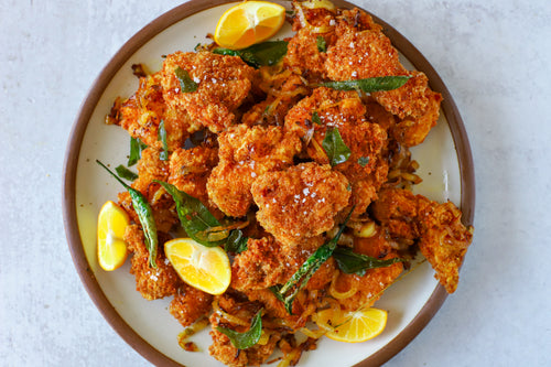 Masala Chicken Nuggets with Caramelized Onions and Curry Leaves