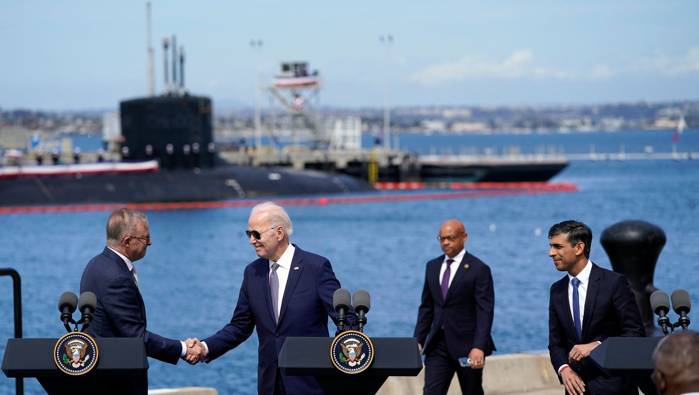 Australian Prime Minister Anthony Albanese shakes hands with President Joe Biden during a news conference with British Prime Minister Rishi Sunak, at Naval Base Point Loma, Monday, March 13, 2023, in San Diego, as they unveil, AUKUS, a trilateral security pact between Australia, Britain, and the United States. (AP Photo/Evan Vucci)