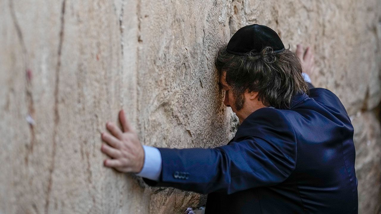 Argentine President Javier Milei prays at the Western Wall.