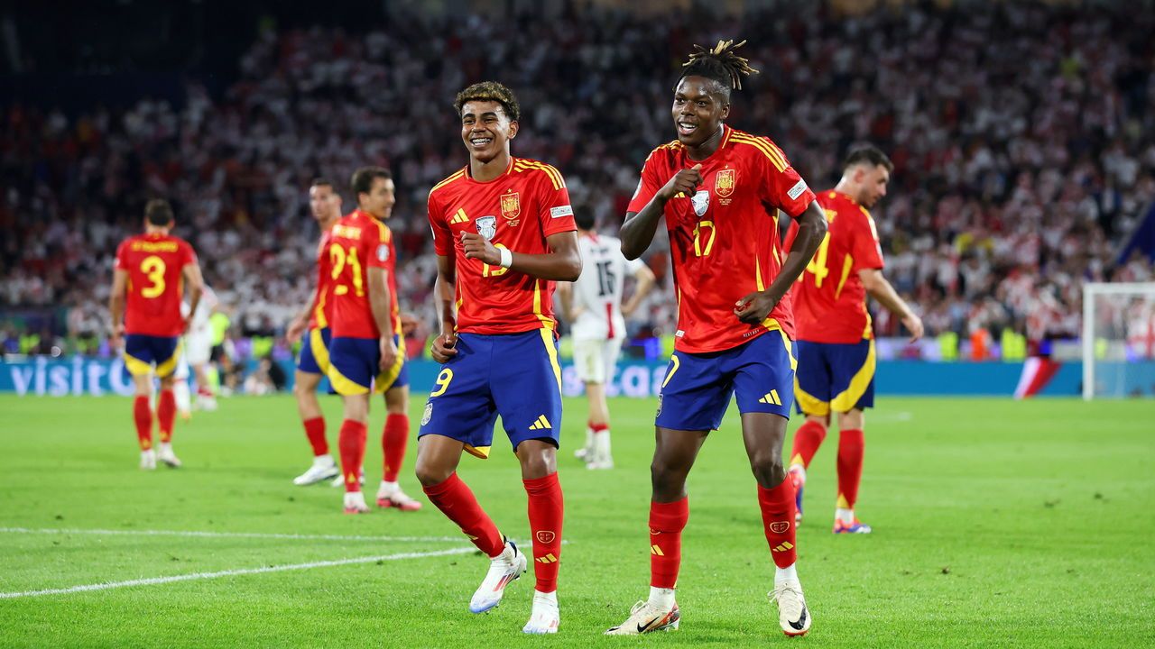 Nico Williams of Spain celebrates scoring his team's third goal with teammate Lamine Yamal during a UEFA EURO 2024 match.