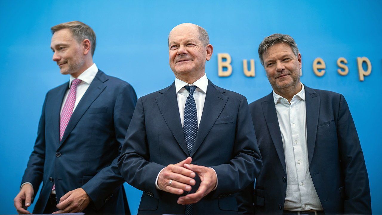 Olaf Scholz,  Robert Habeck, and Christian Lindner take part in a press conference on the 2025 budget.