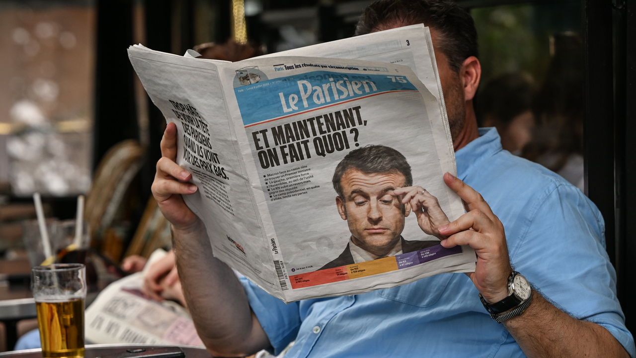 A man reads "Le Parisien" newspaper, seen the day after the second round of the French legislative election in Paris, France on July 5th 2024