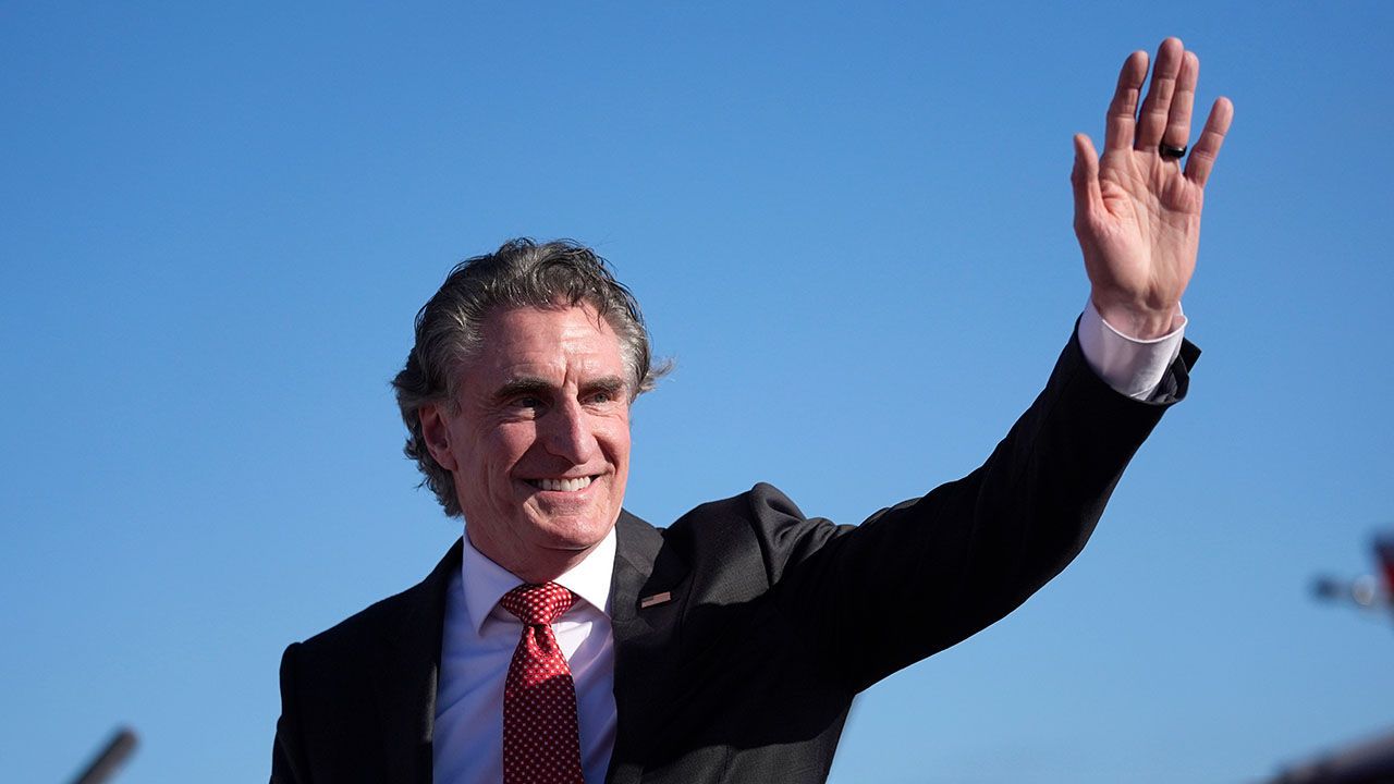 North Dakota Governor Doug Burgum waves at a rally in Wildwood, New Jersey, May 11th 2024