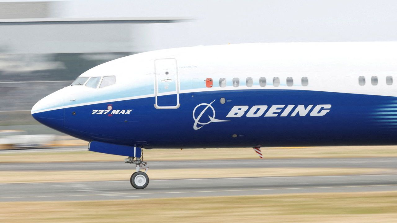 A Boeing 737 Max aircraft during a display at the Farnborough International Airshow, in Farnboro