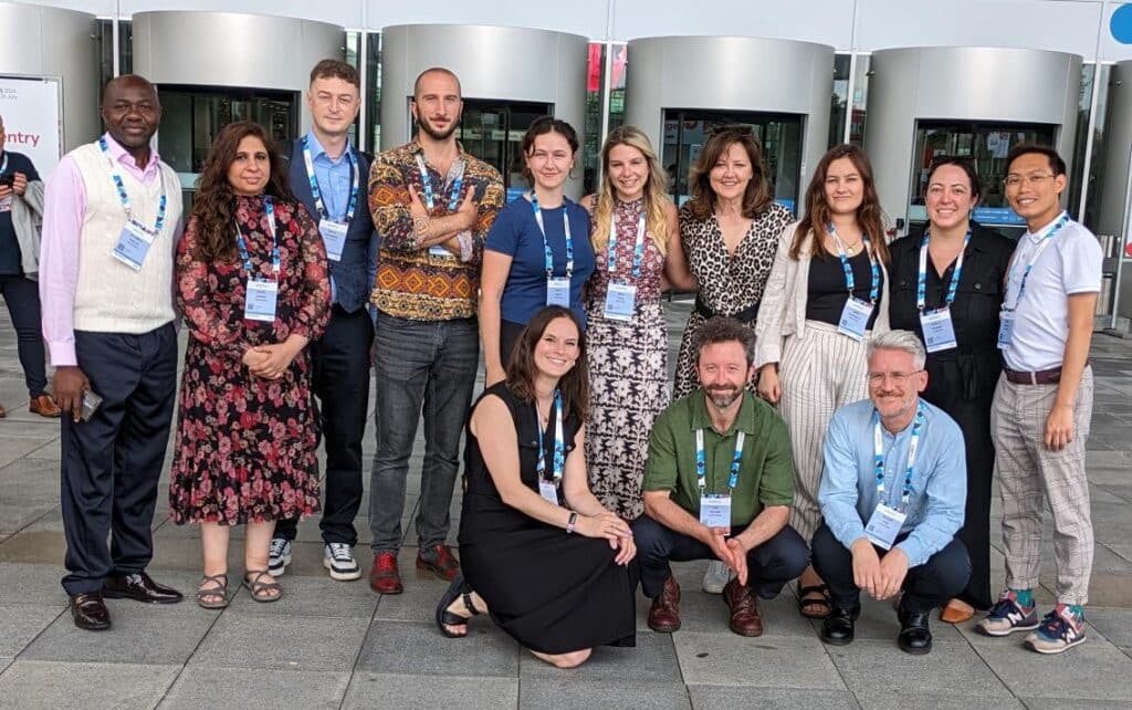 Elton John AIDS Foundation team outside of the AIDS 2024 conference center