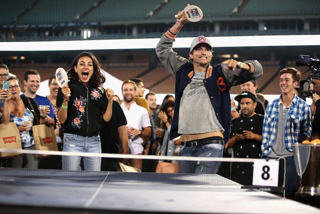 Mila Kunis and Ashton Kutcher at ping pong tournament