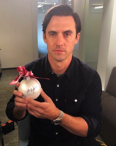 Milo Ventimiglia signs xmas ornament