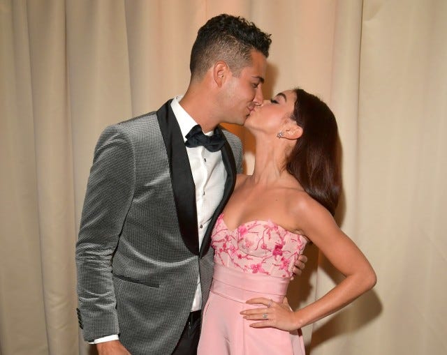 Wells Adams and Sarah Hyland at gg party