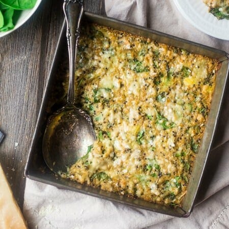 Spinach and Artichoke Quinoa Casserole with Cauliflower Alfredo Sauce - This creamy, gluten free quinoa casserole tastes like spinach and artichoke dip in a healthy, weeknight dinner form! No one will it has hidden veggies and is only 180 calories and 5 SmartPoints! | Foodfaithfitness.com | @FoodFaithFit