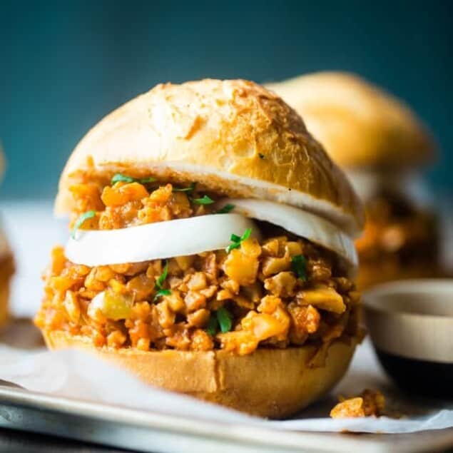 Vegan Sloppy Joes - You will never believe that this quick and easy, one-pot dinner uses cauliflower instead of meat! They're a healthy, gluten free, crowd pleasing dinner that's ready in under 30 mins and are under 300 calories! | Foodfaithfitness.com | @FoodFaithFit