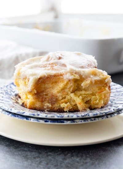 Carrot Cake Rolls are big, FLUFFY AS A CLOUD, & positively studded with super fine shreds of sweet carrots before being rolled up around a spiced buttery brown sugar filling.