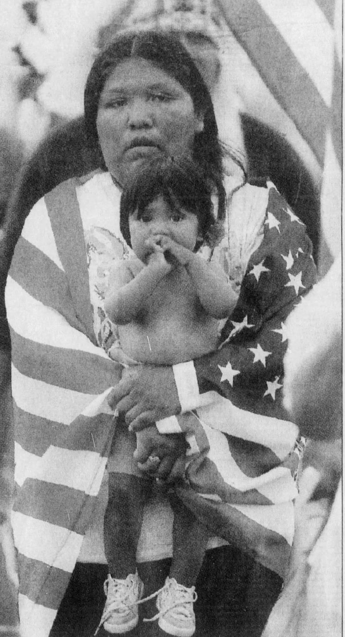 Wendy Thomas and her 11-month-old son, Spear, join protesters on a march from the Fort McDowell Indian Community gambling hall. The march, which began Tuesday and ends today at the state Capitol, is being made to protest the seizure of gambling machines. (Published May 20, 1992)