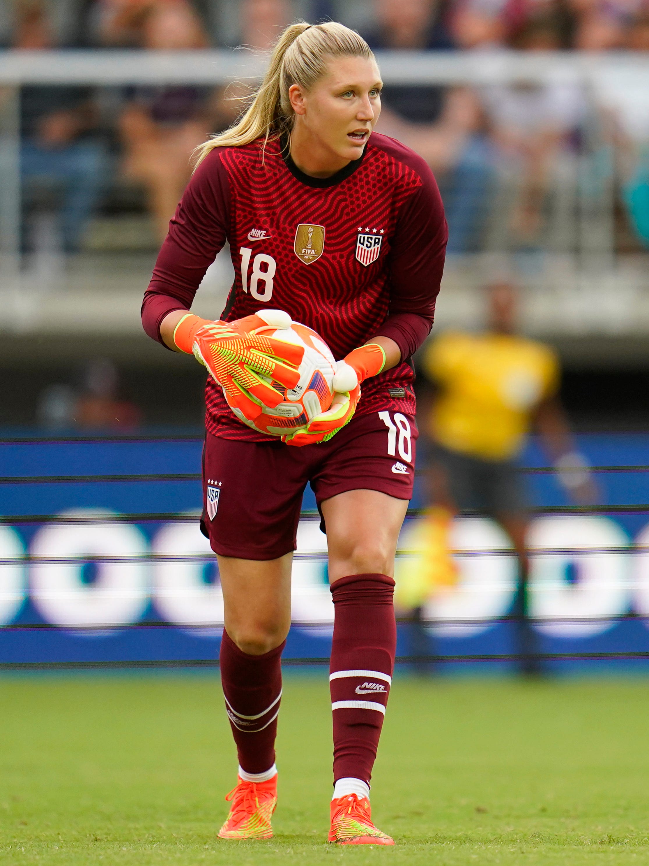 An action image of Casey Murphy playing soccer.