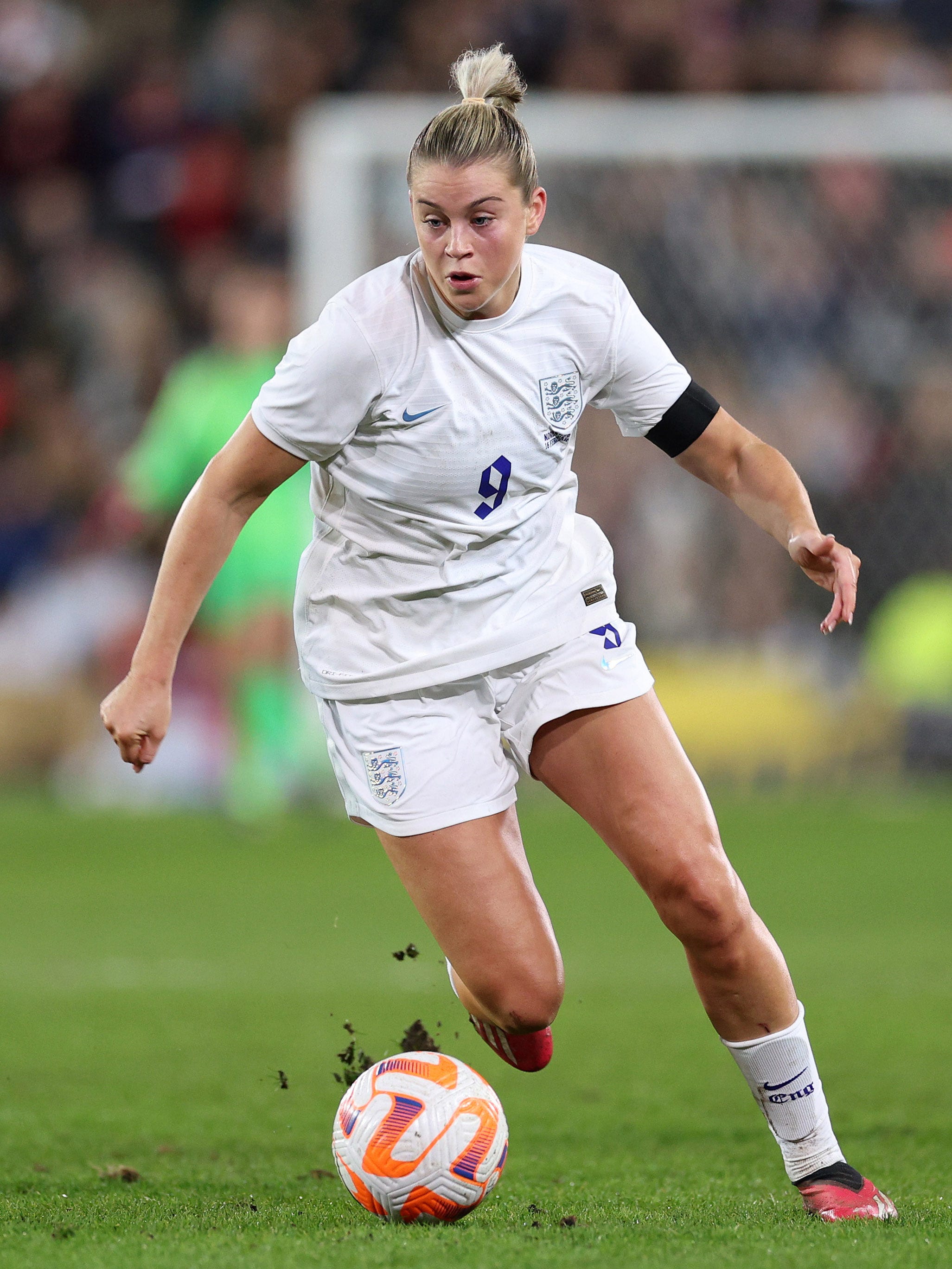 An action image of Alessia Russo playing soccer.