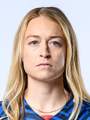 A headshot of Emily Sonnett.