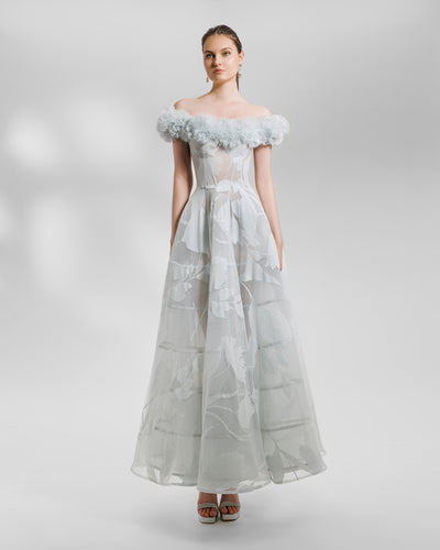 A midi sheer patterned lace grey dress with off-the-shoulders rushed organza neckline, featuring a cage like flared skirt .