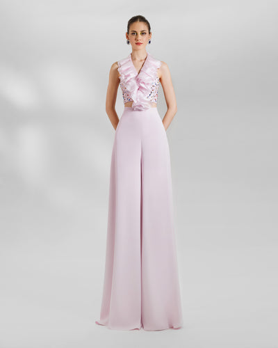 An evening set featuring fully beaded top with a detachable ruffled neckline, paired with wide high-waist pink pants.