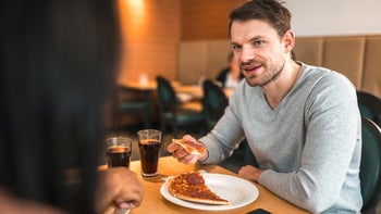 diet-nutrition: man eating pizza 1458548233