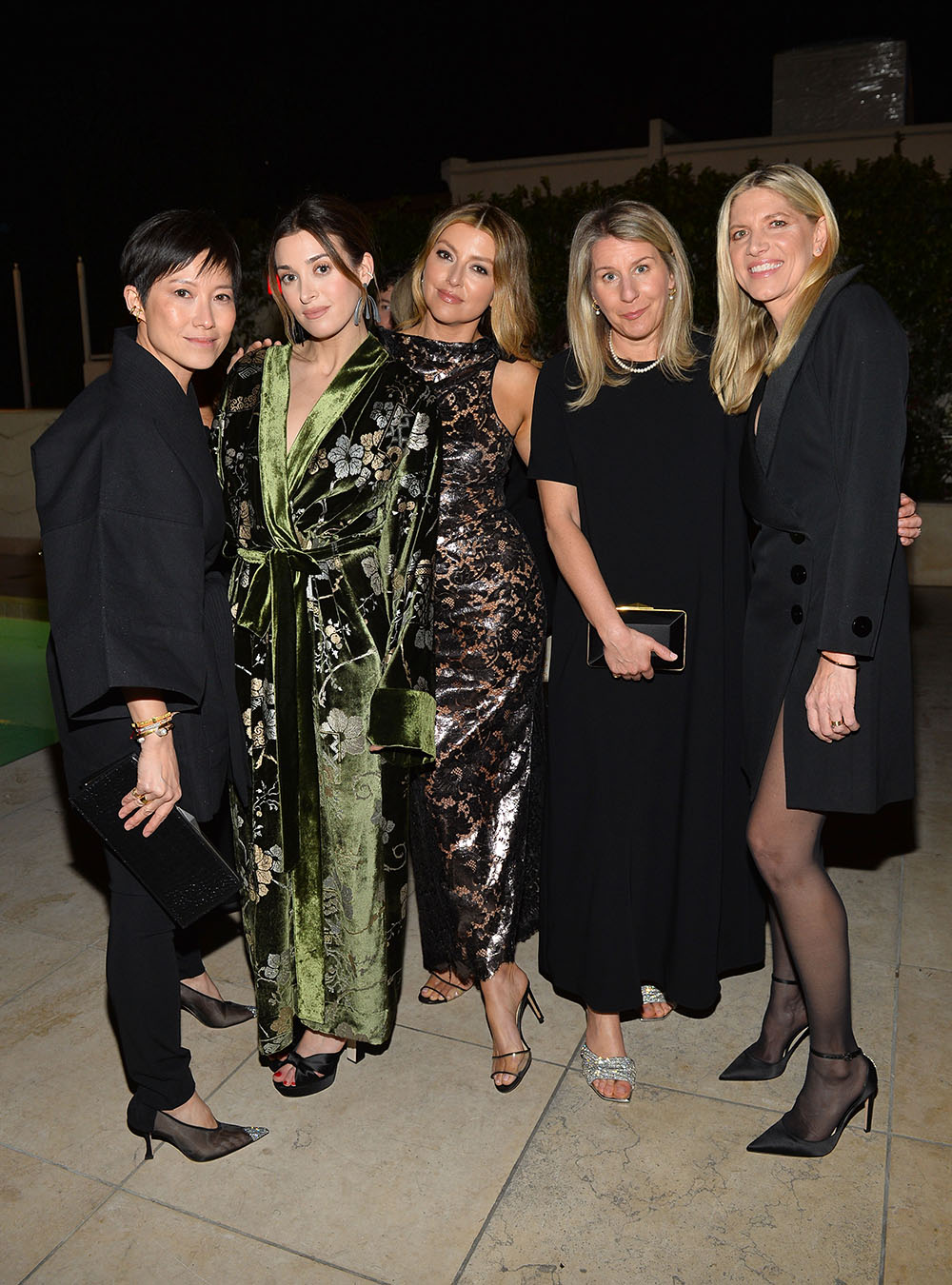 (L-R) Sandra Choi, Jamie Mizrahi, Sara Riff, Emma Woolley, and Petra Flannery attend The Hollywood Reporter And Jimmy Choo Power Stylists Dinner at The Terrace at Sunset Tower on March 28, 2023 in West Hollywood, California.