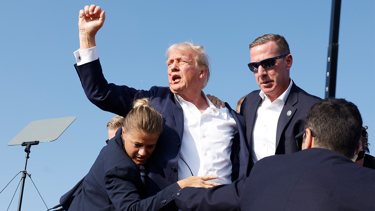 Donald Trump is rushed offstage during a rally on July 13, 2024, in Butler, Pennsylvania.