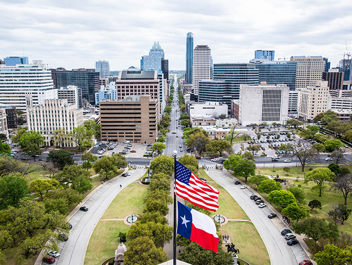 Capitol with Texas State Flag