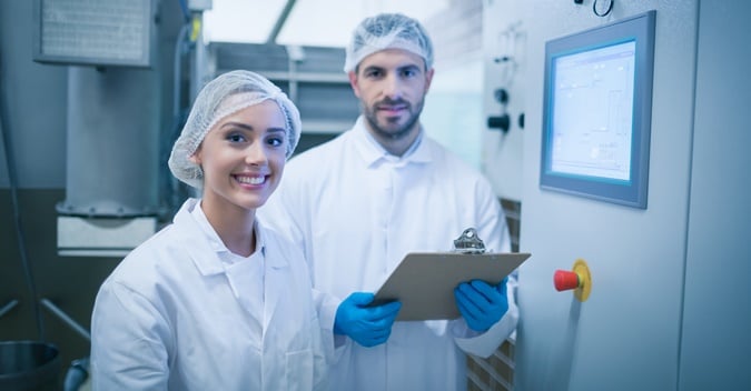 Food Processing Workers Smiling While On The Job