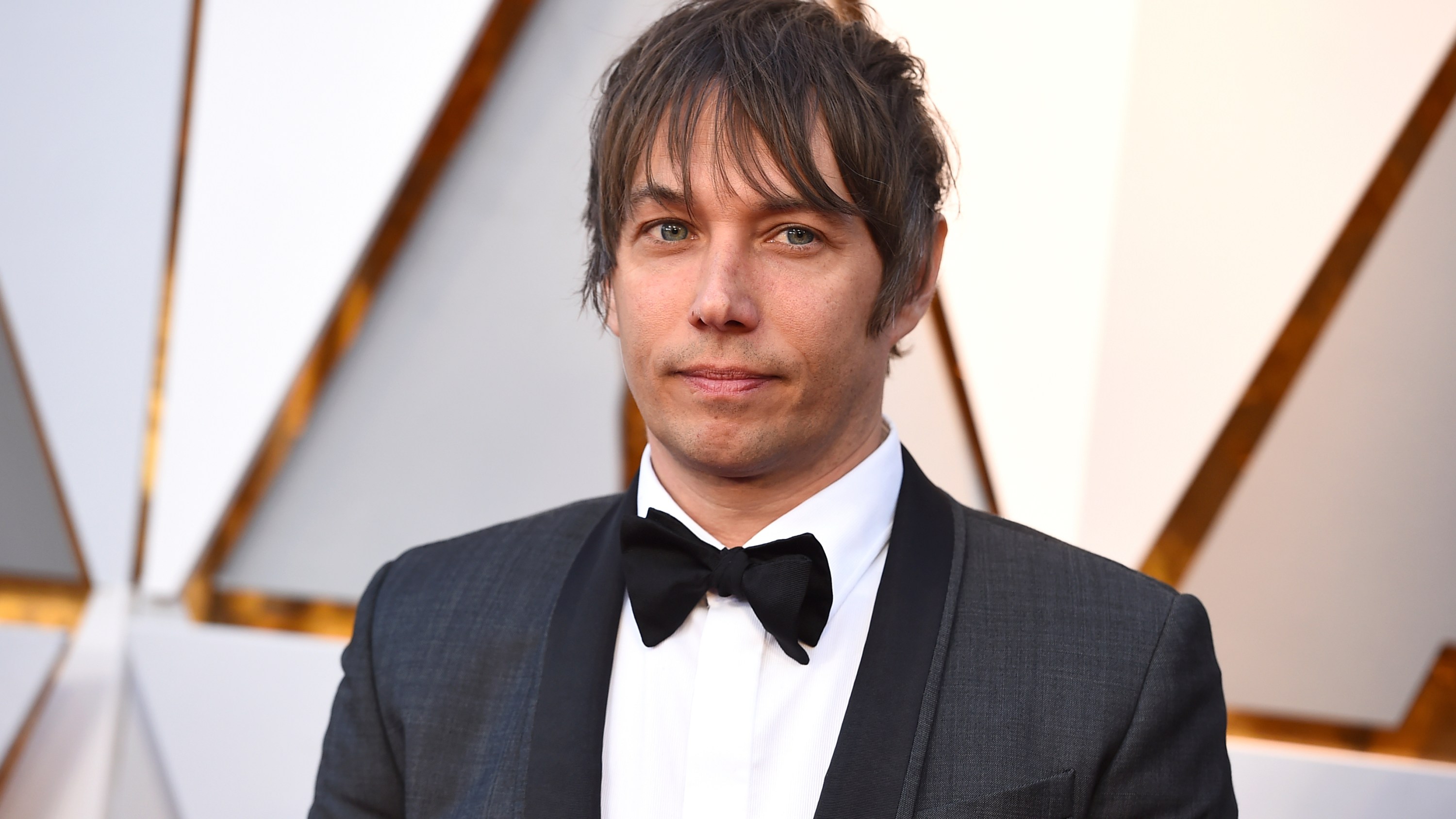 Sean Baker arrives at the Oscars on Sunday, March 4, 2018, at the Dolby Theatre in Los Angeles. (Photo by Jordan Strauss/Invision/AP)