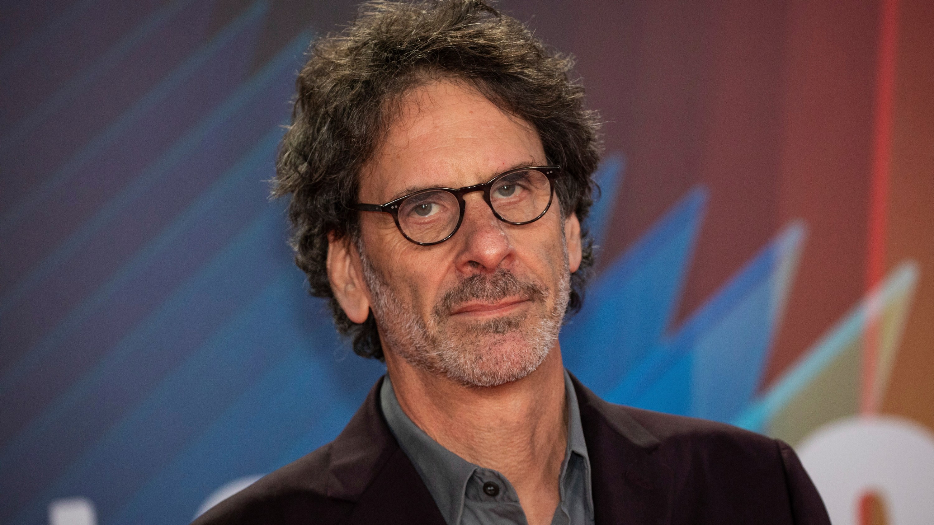 Joel Coen poses for photographers upon arrival at the closing night of the 2021 BFI London Film Festival and the premiere of the film 'The Tragedy of Macbeth' in London, Sunday, Oct. 17, 2021. (Photo by Vianney Le Caer/Invision/AP)