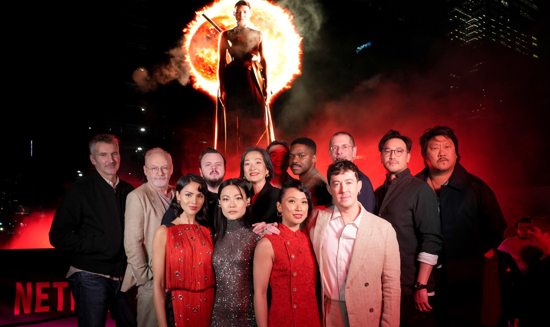 AUSTIN, TEXAS - MARCH 08: (L-R) David Benioff, Liam Cunningham, Eiza González, John Bradley, Zine Tseng, Rosalind Chao, Alexander Woo, Jess Hong, Jovan Adepo, Alex Sharp, D. B. Weiss, Derek Tsang, and Benedict Wong attend the 3 Body Problem World Premiere at SXSW on March 08, 2024 in Austin, Texas. (Photo by Jeff Kravitz/Getty Images for Netflix)