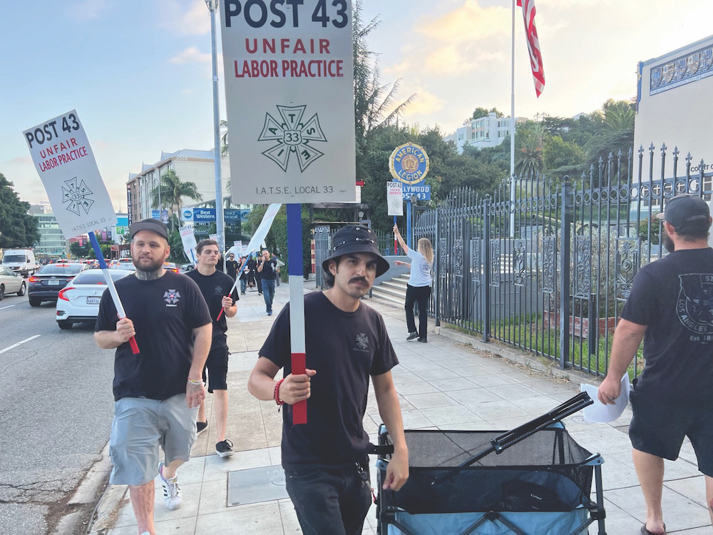 IATSE, which represents projectionists, picketed the theater after accusing the club of bargaining in bad faith.