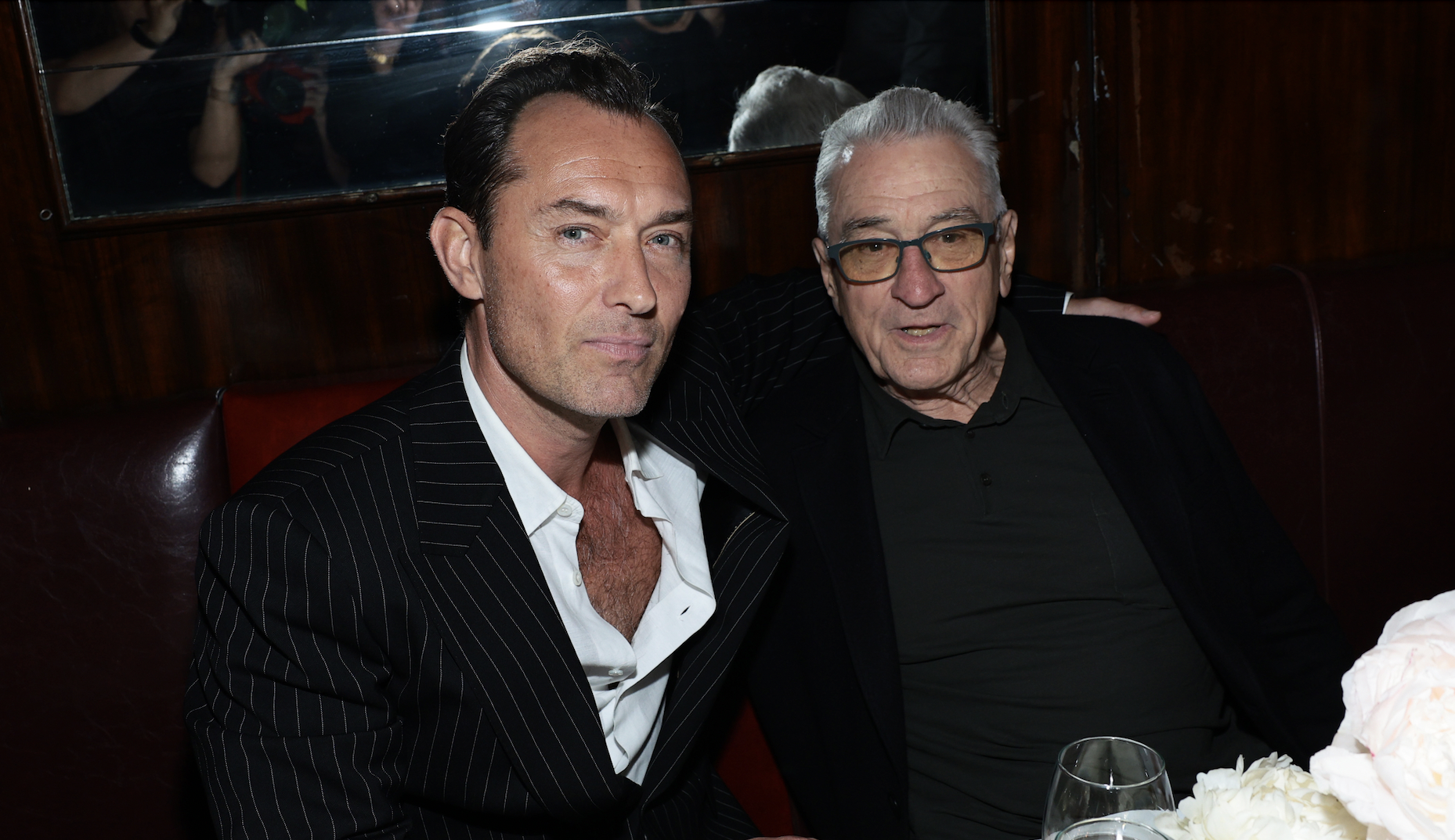 NEW YORK, NEW YORK - JUNE 10: (L-R) Jude Law, wearing CHANEL watch, and Robert De Niro attend the CHANEL Tribeca Festival Artists Dinner at The Odeon on June 10, 2024 in New York City.  (Photo by Dimitrios Kambouris/WireImage)