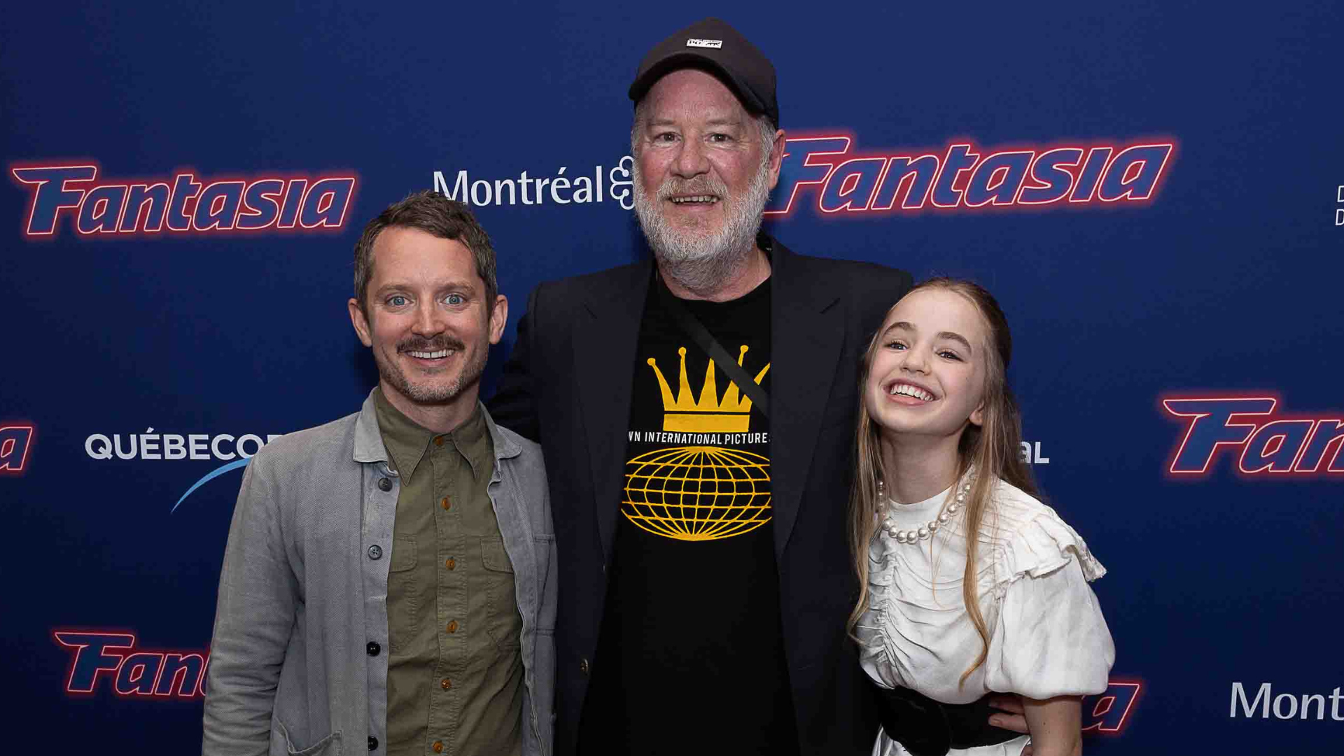 (Left to right): Elijah Wood, Ant Timpson, and Nell Fisher at the world premiere of "Bookworm"