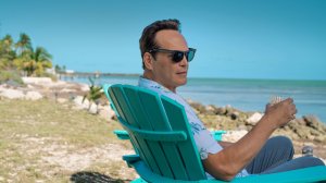 Vince Vaughn in 'Bad Monkey,' shown here sitting in a turquoise chair overlooking the ocean