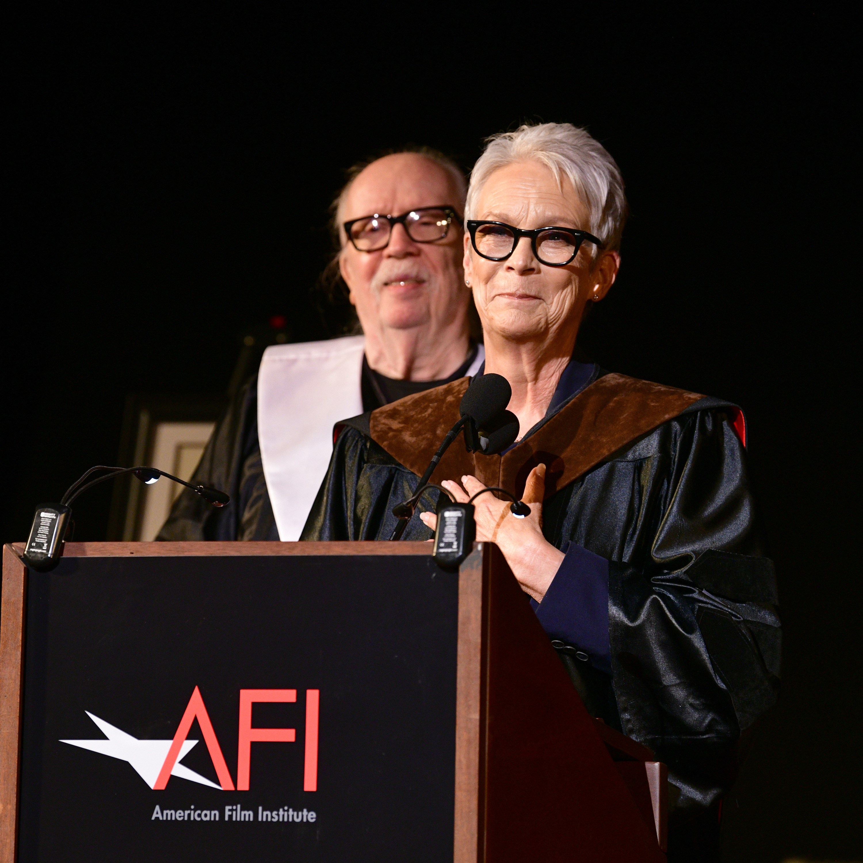 HOLLYWOOD, CALIFORNIA - AUGUST 10: John Carpenter and Jamie Lee Curtis attend the AFI Commencement - Class of 2024 honoring recipient Jamie Lee Curtis at TCL Chinese Theatre on August 10, 2024 in Hollywood, California. (Photo by Araya Doheny/Getty Images)