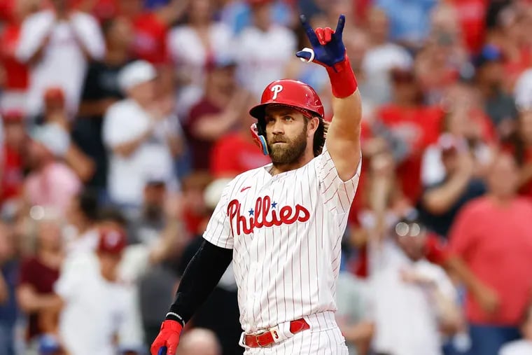 Harper celebrates his fifth-inning home run against the Royals on Saturday.