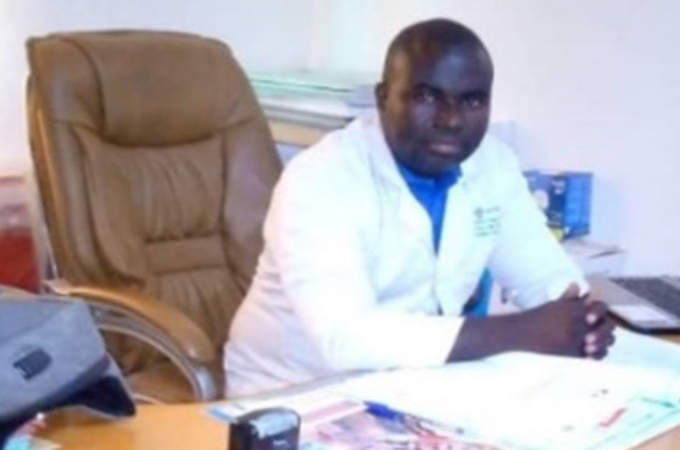 Man working in a community radio station in Kenya