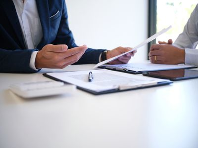 cropped image of accountant at desk