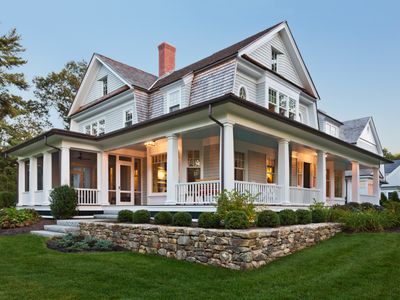Large home with wraparound porch