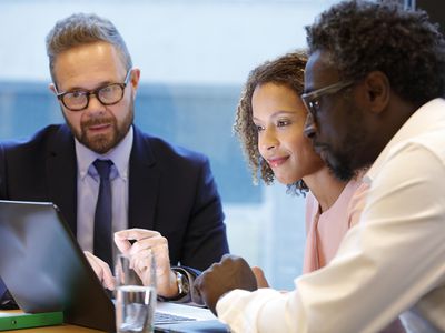 Financial advisor having a meeting with clients